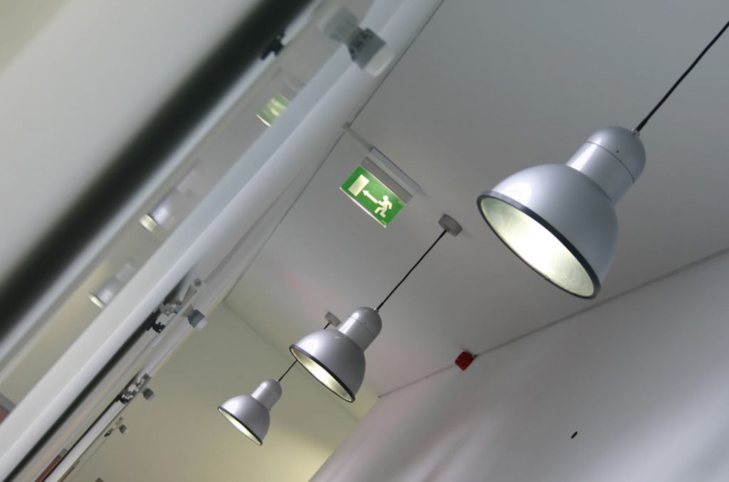 During a fire emergency, people need to clearly see where the emergency lighting systems are placed.